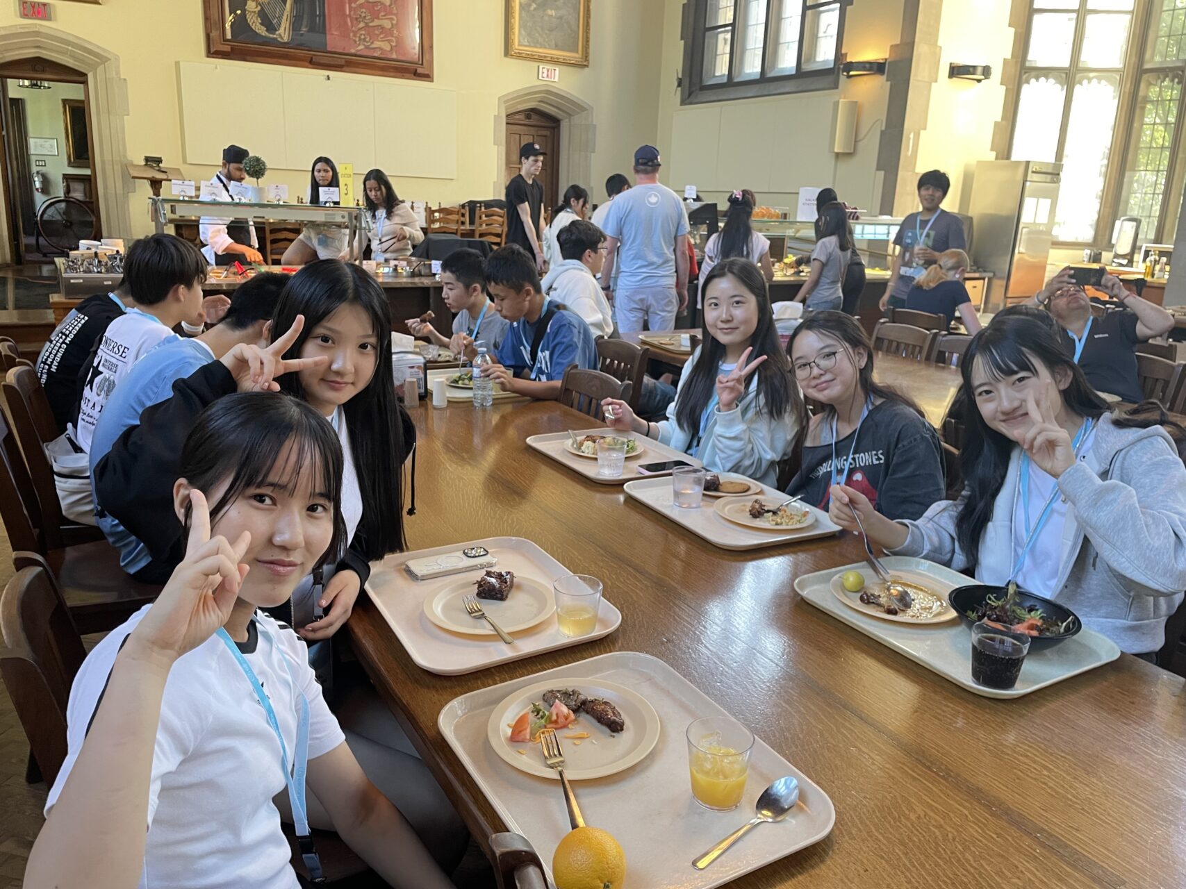 Junior study abroad students having a meal together in the cafeteria